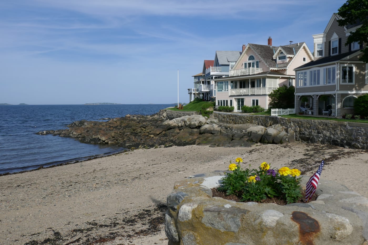 Waterfront houses and rocky shoreline at Juniper Point in Salem, Massachusetts